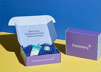 Custom cosmetic mailer boxes with branded interior print and crinkle paper